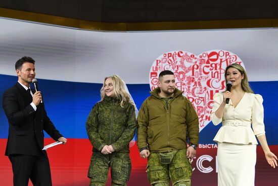RUSSIA EXPO. Special military operation participants' marriage ceremony on anniversary of its launch