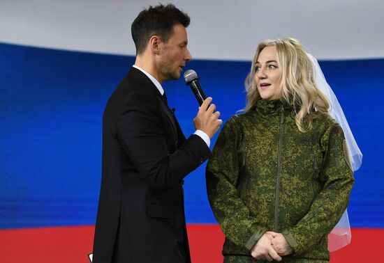 RUSSIA EXPO. Special military operation participants' marriage ceremony on anniversary of its launch