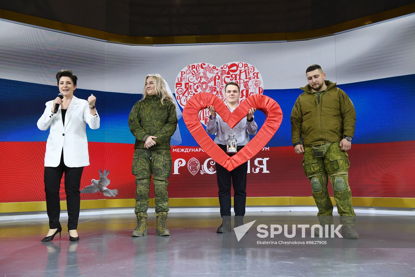 RUSSIA EXPO. Special military operation participants' marriage ceremony on anniversary of its launch