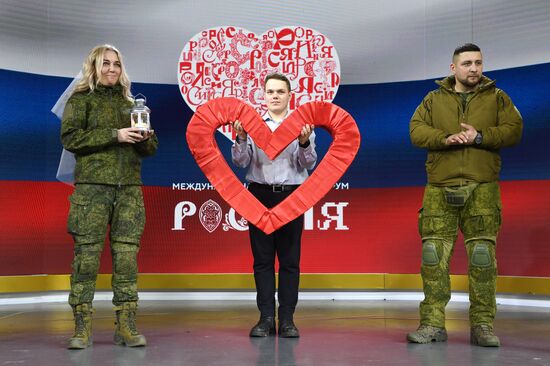 RUSSIA EXPO. Special military operation participants' marriage ceremony on anniversary of its launch