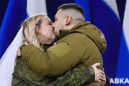 RUSSIA EXPO. Special military operation participants' marriage ceremony on anniversary of its launch