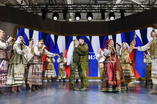 RUSSIA EXPO. Special military operation participants' marriage ceremony on anniversary of its launch
