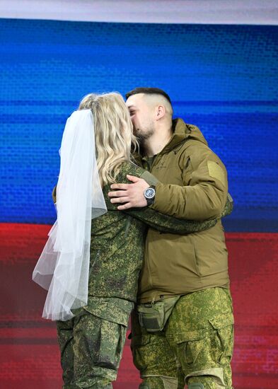 RUSSIA EXPO. Special military operation participants' marriage ceremony on anniversary of its launch