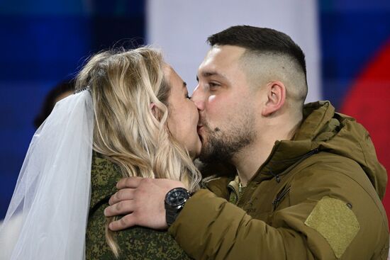 RUSSIA EXPO. Special military operation participants' marriage ceremony on anniversary of its launch
