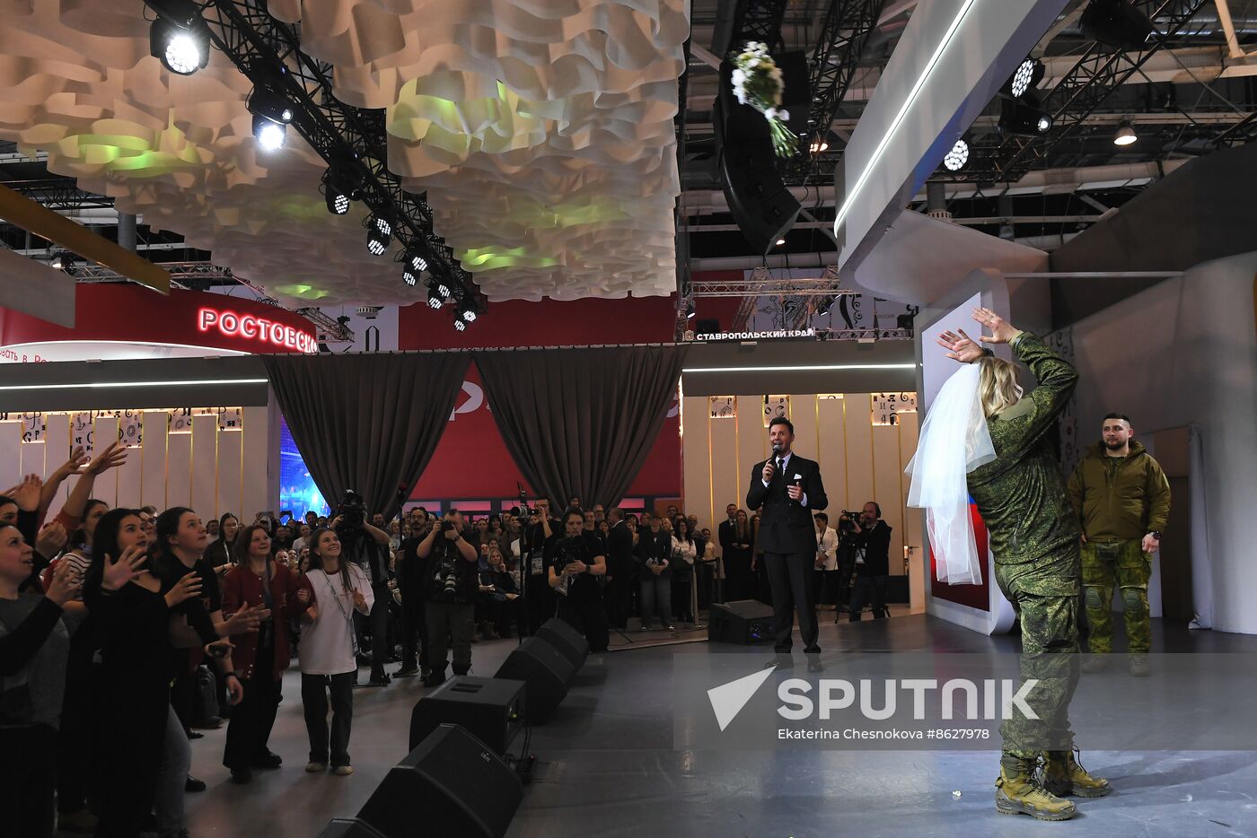 RUSSIA EXPO. Special military operation participants' marriage ceremony on anniversary of its launch