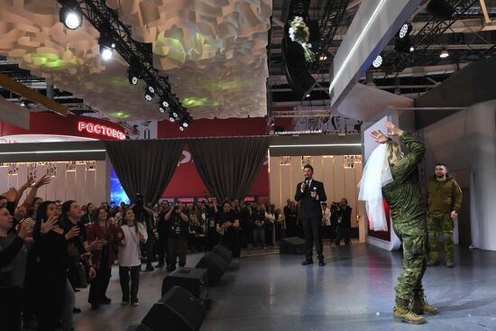 RUSSIA EXPO. Special military operation participants' marriage ceremony on anniversary of its launch