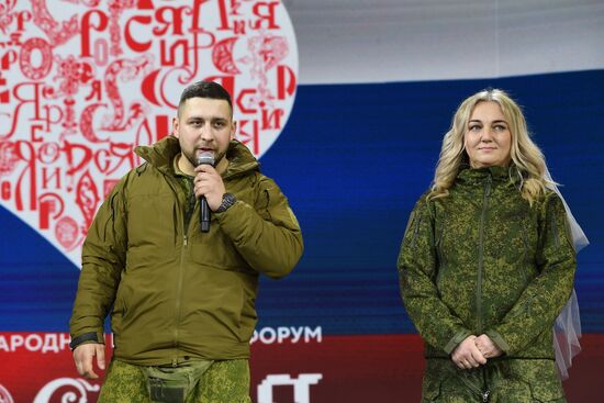 RUSSIA EXPO. Special military operation participants' marriage ceremony on anniversary of its launch