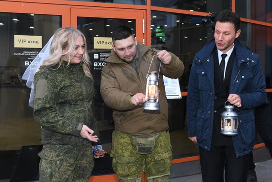 RUSSIA EXPO. Special military operation participants' marriage ceremony on anniversary of its launch