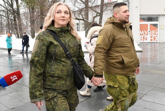 RUSSIA EXPO. Special military operation participants' marriage ceremony on anniversary of its launch