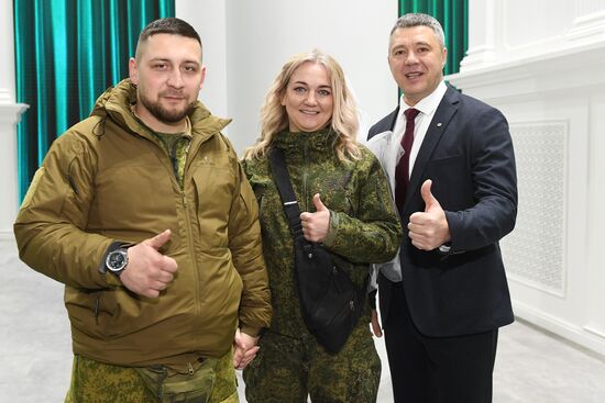 RUSSIA EXPO. Special military operation participants' marriage ceremony on anniversary of its launch