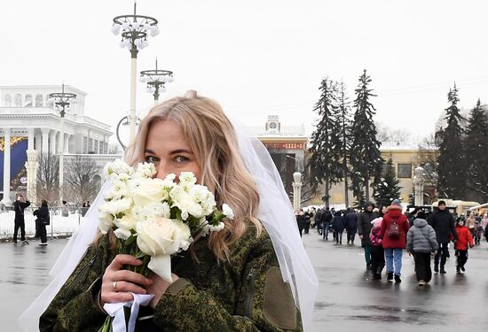 RUSSIA EXPO. Special military operation participants' marriage ceremony on anniversary of its launch