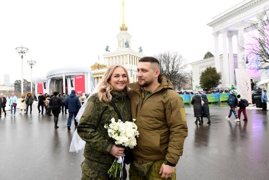 RUSSIA EXPO. Special military operation participants' marriage ceremony on anniversary of its launch