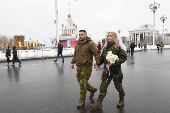 RUSSIA EXPO. Special military operation participants' marriage ceremony on anniversary of its launch