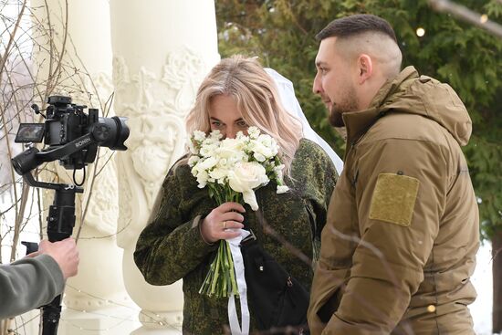 RUSSIA EXPO. Special military operation participants' marriage ceremony on anniversary of its launch