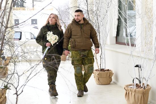 RUSSIA EXPO. Special military operation participants' marriage ceremony on anniversary of its launch