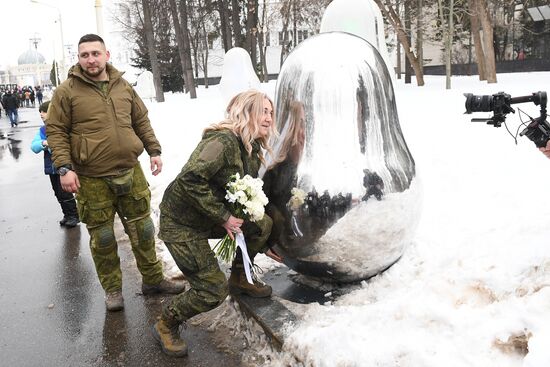 RUSSIA EXPO. Special military operation participants' marriage ceremony on anniversary of its launch