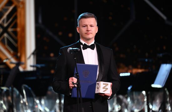 The International RUSSIA EXPO forum and exhibition. The Knowledge: Prize education awards ceremony. The Contribution to Education in History: Best Project category. Andrei Shirokov, the prize laureate, head of the Faces of Victory project. Location: Russia, Moscow. Author: Vladimir Astapkovich/Sputnik. RUSSIA EXPO. Knowledge: Prize education awards ceremony