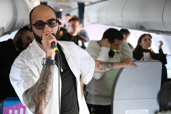 Flight with artists from Moscow to the Youth Festival in Sochi