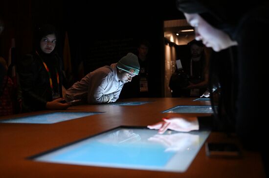 The International RUSSIA EXPO Forum and Exhibition. A tour for World Youth Festival participants. The Atom Pavilion. Location: Russia, Moscow. Author: Grigory Sysoev/Sputnik. RUSSIA EXPO. Tour for World Youth Festival participants