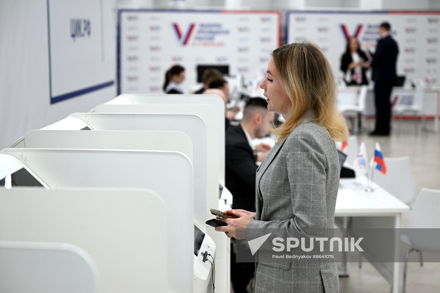 RUSSIA EXPO. Russia Expo Director General Natalya Virtuozova votes in the Russian presidential election