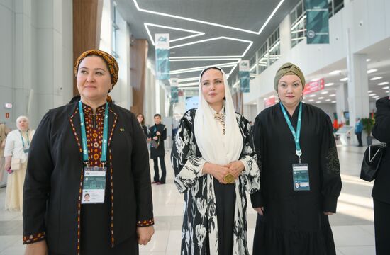 The KAZANFORUM 2024: Russia – Islamic World. From left: Aina Durdylyeva, Director General of the Mahirli Zenan Turkmen national fashion house, Dilyara Sadriyeva, Director of the Council of Modest Fashion International Noncommercial Organization, and Elvira Khamitova, individual entrepreneur. Photos can be used on terms listed in the media-bank's Forum section. Location: Russia, Republic of Tatarstan, Kazan. Author: Kristina Kormilitsyna/Sputnik. Russia – Islamic World: KAZANFORUM 2024