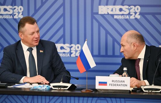 Belarusian Emergency Situations Minister Vadim Sinyavsky and Russian Emergency Situations Minister Alexander Kurenkov attend a meeting of the Heads of BRICS Emergency Agencies in Kazan, Republic of Tatarstan, Russia. Location: Russia, Republic of Tatarstan, Kazan. Author: Maksim Bogodvid/Sputnik. Meeting of the Heads of BRICS Emergency Agencies