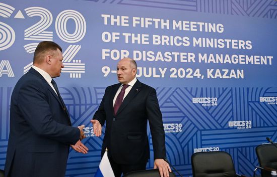 Belarusian Emergency Situations Minister Vadim Sinyavsky and Russian Emergency Situations Minister Alexander Kurenkov take a break in a meeting of the Heads of BRICS Emergency Agencies in Kazan, Republic of Tatarstan, Russia. Location: Russia, Republic of Tatarstan, Kazan. Author: Maksim Bogodvid/Sputnik. Meeting of the Heads of BRICS Emergency Agencies