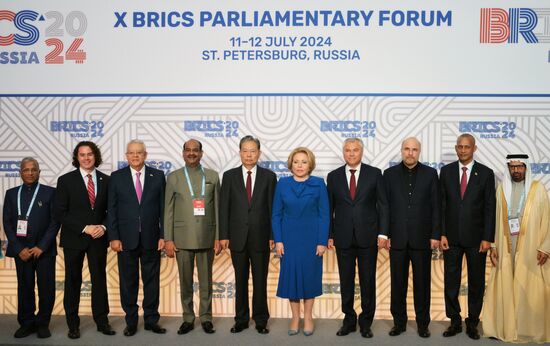 The BRICS Parliamentary Forum. A joint photo session of the heads of BRICS parliamentary delegations. From left: Harivansh Harivansh Narayan Singh, Deputy Chairman of the Council of States of the Parliament of the Republic of India (Upper House); Veneziano Vital do Rego Segundo Neto, First Deputy Chairman of the Federal Senate of the National Congress of Brazil; Hanafy Ali El Gebaly, Speaker of the House of Representatives (Egypt), Head of the delegation; Om Birla, Speaker of the Lower House of Parliament India; Zhao Leji, Chairman of the Standing Committee of the National People's Congress of China; Valentina Matviyenko, Speaker of the Federation Council of the Russian Federation, Vyacheslav Volodin, Speaker of the State Duma of the Russian Federation; Mohammad Bagher Ghalibaf, Speaker of the Islamic Consultative Assembly of the Islamic Republic of Iran; Agegnehu Teshager, Speaker of the Federation Council of Ethiopia; and Ali Rashid Al-Nuaimi, Chairman of the Defense, Internal and Foreign Policy Committee of the UAE Federal National Council. Location: Russia, St. Petersburg. Author: Alexei Danichev. 10th BRICS Parliamentary Forum