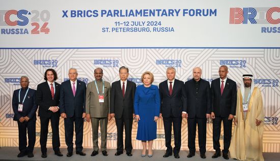 The BRICS Parliamentary Forum. A joint photo session of the heads of BRICS parliamentary delegations. From left: Harivansh Harivansh Narayan Singh, Deputy Chairman of the Council of States of the Parliament of the Republic of India (Upper House); Veneziano Vital do Rego Segundo Neto, First Deputy Chairman of the Federal Senate of the National Congress of Brazil; Hanafy Ali El Gebaly, Speaker of the House of Representatives (Egypt), Head of the delegation; Om Birla, Speaker of the Lower House of Parliament India; Zhao Leji, Chairman of the Standing Committee of the National People's Congress of China; Valentina Matviyenko, Speaker of the Federation Council of the Russian Federation, Vyacheslav Volodin, Speaker of the State Duma of the Russian Federation; Mohammad Bagher Ghalibaf, Speaker of the Islamic Consultative Assembly of the Islamic Republic of Iran; Agegnehu Teshager, Speaker of the Federation Council of Ethiopia; and Ali Rashid Al-Nuaimi, Chairman of the Defense, Internal and Foreign Policy Committee of the UAE Federal National Council. Location: Russia, St. Petersburg. Author: Alexei Danichev. 10th BRICS Parliamentary Forum