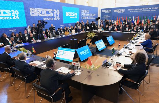 The BRICS Parliamentary Forum. Meeting, Parliaments' Role in Increasing the Efficiency of the International Relations System and Ensuring its Democratization. Left, background: Russian Federation Council Speaker Valentina Matviyenko. Location: Russia, St. Petersburg. Author: Alexei Danichev. 10th BRICS Parliamentary Forum