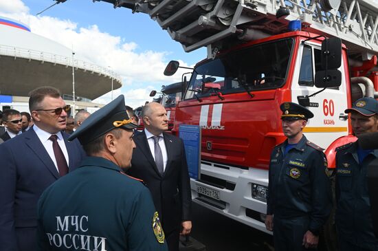 The Meeting of the Heads of BRICS Emergency Agencies. A tour of the fire and rescue equipment. Left: Vadim Sinyavsky, Emergencies Minister of Belarus. Center: Minister for Civil Defence, Emergencies and Natural Disaster Relief of the Russian Federation Alexander Kurenkov. Location: Russia, Republic of Tatarstan, Kazan. Author: Mikhail Voskresenskiy. Meeting of the Heads of BRICS Emergency Agencies