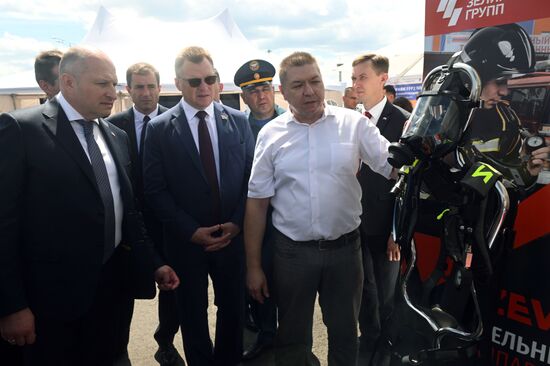 The Meeting of the Heads of BRICS Emergency Agencies. A tour of the fire and rescue equipment exhibition. Left: Minister for Civil Defence, Emergencies and Natural Disaster Relief of the Russian Federation Alexander Kurenkov, center left: Vadim Sinyavsky, Emergencies Minister of Belarus. Location: Russia, Republic of Tatarstan, Kazan. Author: Mikhail Voskresenskiy. Meeting of the Heads of BRICS Emergency Agencies