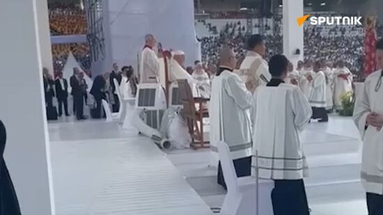 Pope Francis holds a mass at the Gelora Bung Karno Stadium in Jakarta