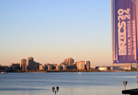 A view shows a banner with the logo of the upcoming 16th BRICS Summit, with the Novo-Savinovsky district and the Kazanka River seen in the background, in Kazan, Republic of Tatarstan, Russia. Location: Russia, Republic of Tatarstan, Kazan. Author: Maksim Bogodvid. Preparations for 16th BRICS Summit in Kazan