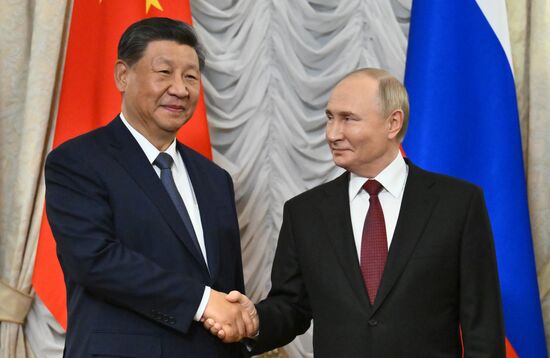 16th BRICS Summit. President Vladimir Putin meets with President of China Xi Jinping