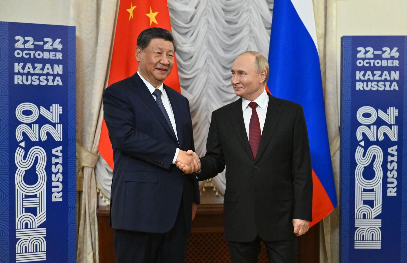 16th BRICS Summit. President Vladimir Putin meets with President of China Xi Jinping