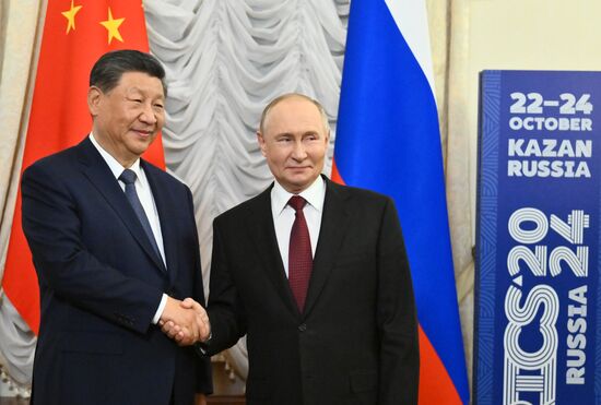 16th BRICS Summit. President Vladimir Putin meets with President of China Xi Jinping