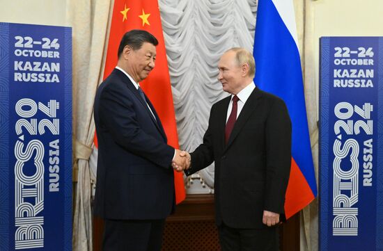 16th BRICS Summit. President Vladimir Putin meets with President of China Xi Jinping