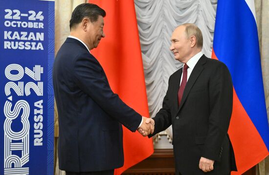 16th BRICS Summit. President Vladimir Putin meets with President of China Xi Jinping