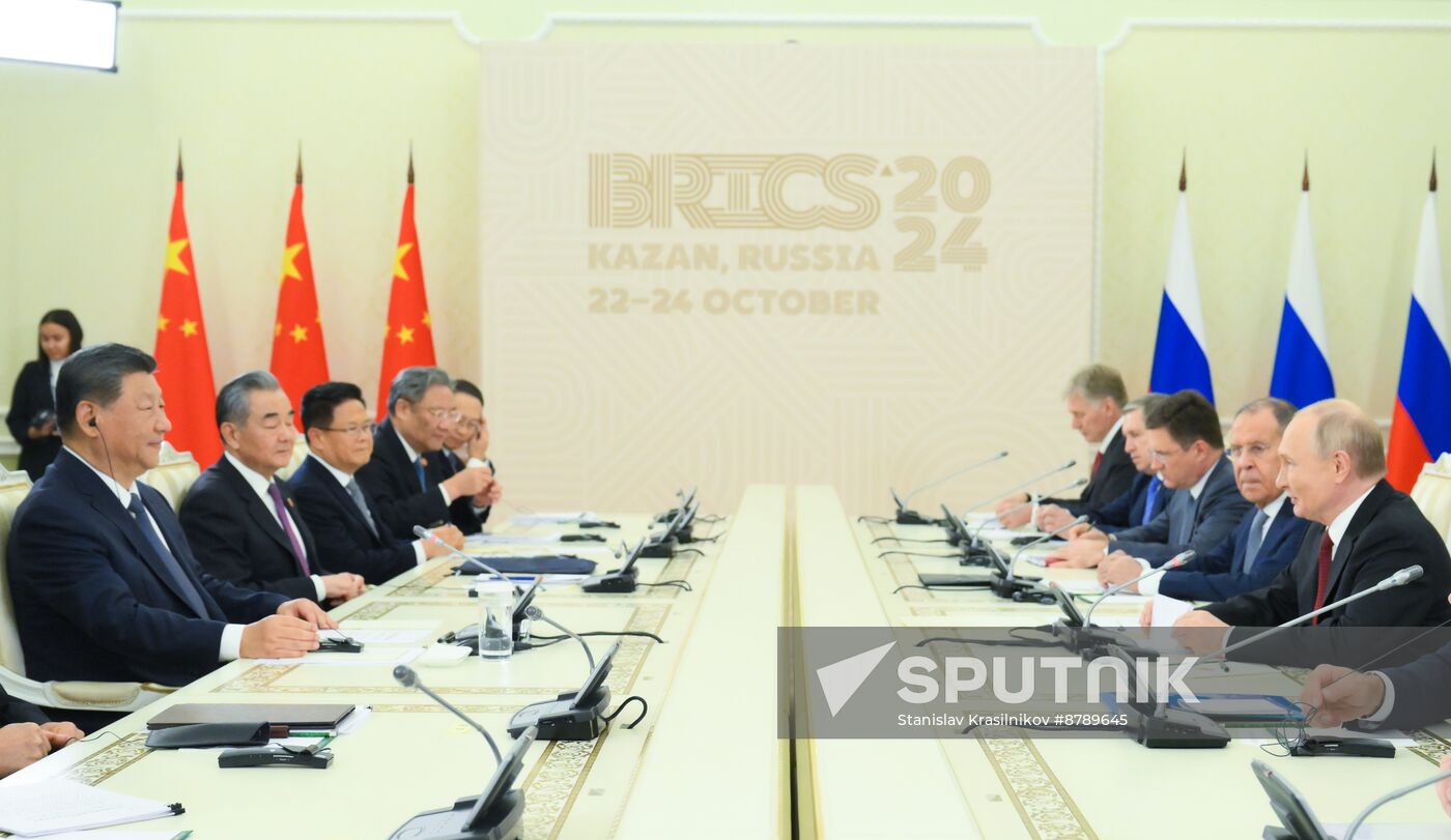 16th BRICS Summit. President Vladimir Putin meets with President of China Xi Jinping