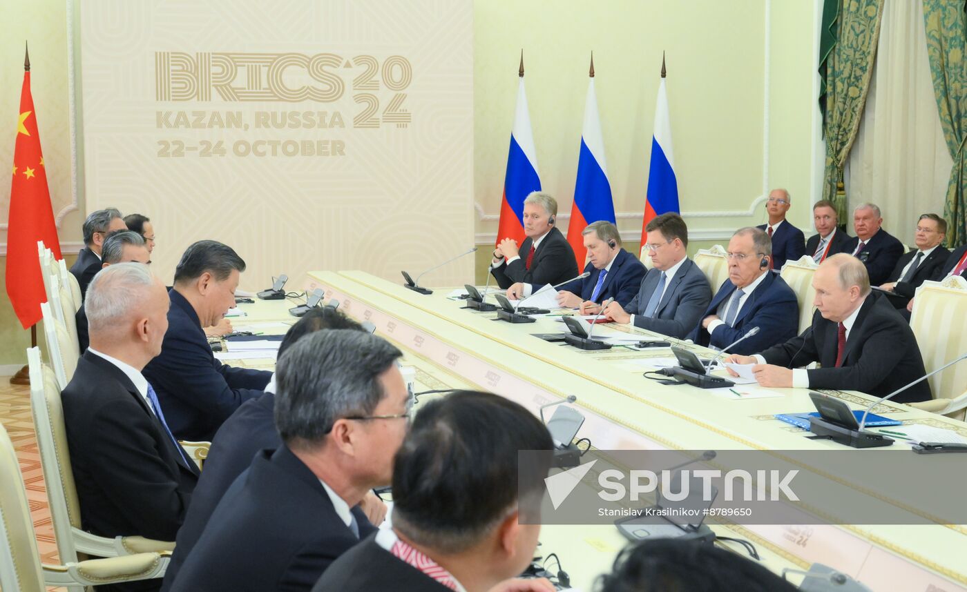 16th BRICS Summit. President Vladimir Putin meets with President of China Xi Jinping