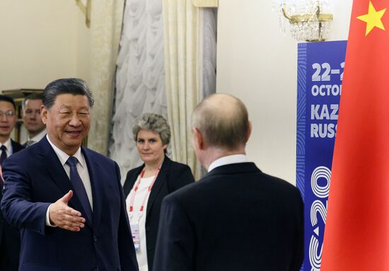 16th BRICS Summit. President Vladimir Putin meets with President of China Xi Jinping