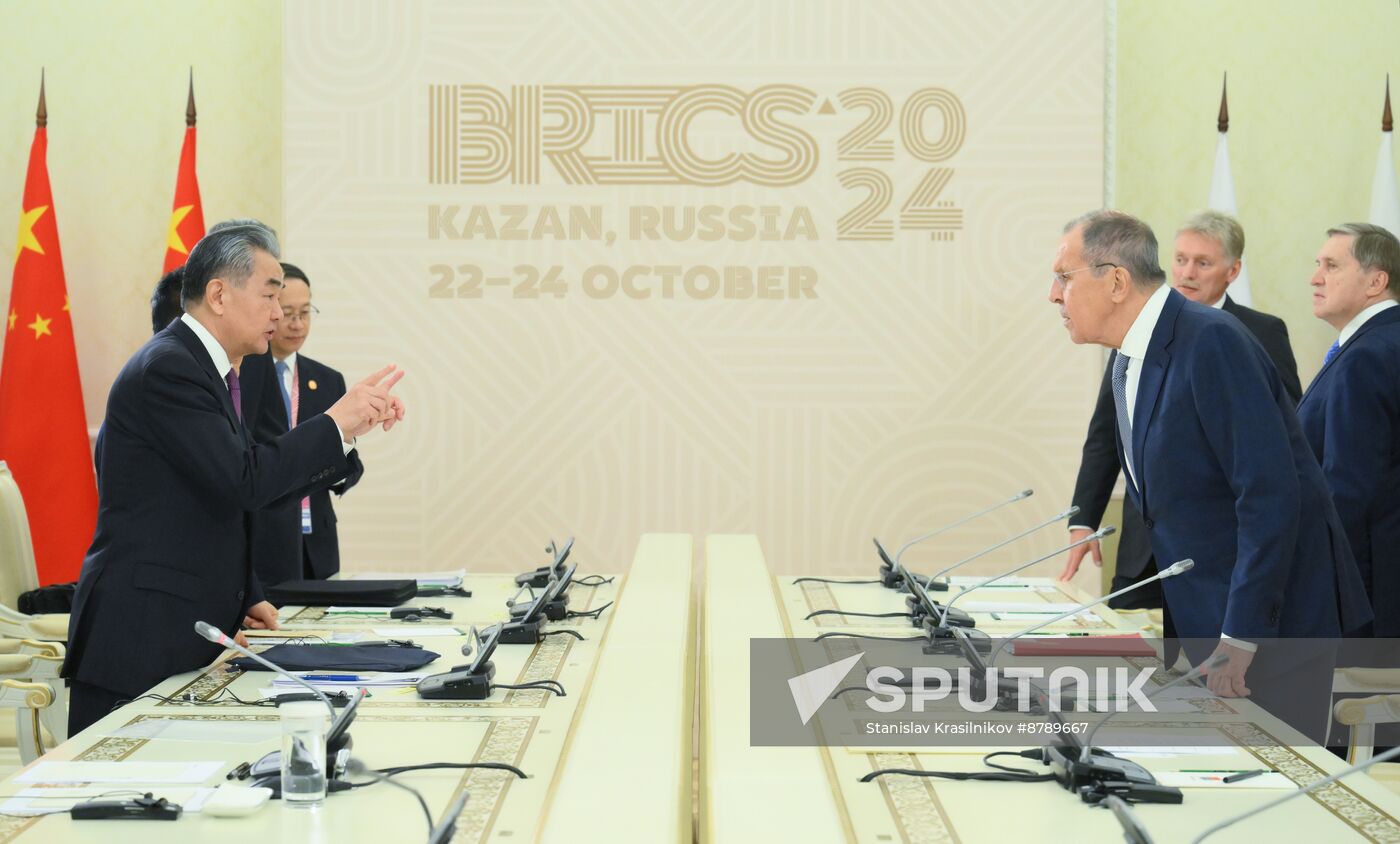 16th BRICS Summit. President Vladimir Putin meets with President of China Xi Jinping