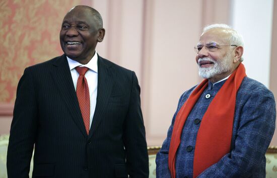 South African President Cyril Ramaphosa and Indian Prime Minister Narendra Modi react before an informal dinner and a concert for heads of the delegations at the 16th BRICS summit in Kazan, Republic of Tatarstan, Russia. Location: Russia, Kazan. Author: Mikhail Metzel/Sputnik. 16th BRICS Summit. Informal lunch for the heads of BRICS delegations