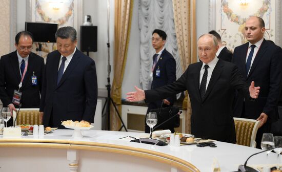 From right: President of Russia Vladimir Putin and President of China Xi Jinping during an informal lunch for the heads of BRICS delegations held as part of the 16th BRICS summit in Kazan. Location: Russia, Republic of Tatarstan, Kazan. Author: Sergey Bobylev. 16th BRICS Summit. Informal lunch for the heads of BRICS delegations
