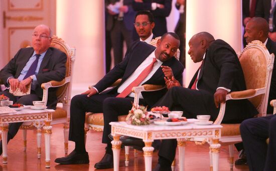 From left: Foreign Minister of Brazil Mauro Vieira, Prime Minister of Ethiopia Abiy Ahmed Ali, and President of South Africa Cyril Ramaphosa during a concert ahead of an informal lunch for the heads of BRICS delegations held as part of the 16th BRICS summit in Kazan. Location: Russia, Republic of Tatarstan, Kazan. Author: Alexandr Kryazhev. 16th BRICS Summit. Informal lunch for the heads of BRICS delegations