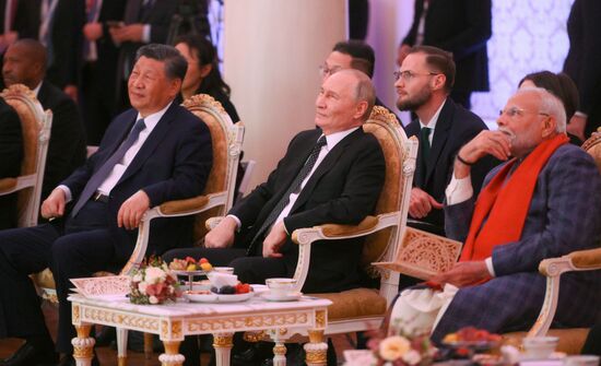 From left: President of China Xi Jinping, President of Russia Vladimir Putin, and Prime Minister of India Narendra Modi during a concert ahead of an informal lunch for the heads of BRICS delegations held as part of the 16th BRICS summit in Kazan. Location: Russia, Republic of Tatarstan, Kazan. Author: Alexandr Kryazhev. 16th BRICS Summit. Informal lunch for the heads of BRICS delegations