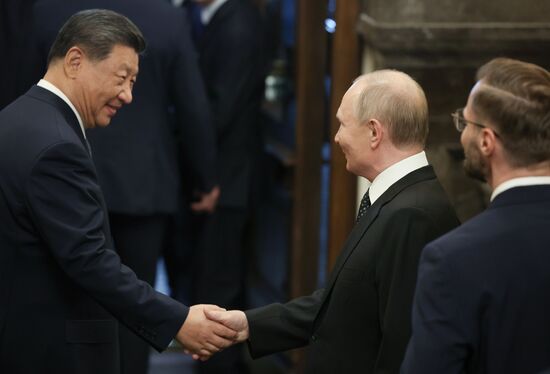 Russian President Vladimir Putin and Chinese President Xi Jinping shake hands after an informal dinner and a concert for heads of the delegations at the 16th BRICS summit in Kazan, Republic of Tatarstan, Russia. Location: Russia, Republic of Tatarstan, Kazan. Author: Alexander Kazakov/Sputnik. 16th BRICS Summit. Informal lunch for the heads of BRICS delegations