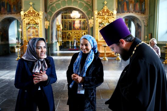 Left: Zinash Tayachew, Representative of the Organization of African First Ladies, the Prime Minister of Ethiopia's wife, during a tour of the women's program of the XVI BRICS summit in Kazan. Location: Russia, Republic of Tatarstan, Kazan. Author: Alexey Maishev. 16th BRICS Summit. Women's program