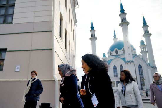 Second left: Zinash Tayachew, Representative of the Organization of African First Ladies, the Prime Minister of Ethiopia's wife, during a tour of the women's program of the XVI BRICS summit in Kazan. Location: Russia, Republic of Tatarstan, Kazan. Author: Alexey Maishev. 16th BRICS Summit. Women's program